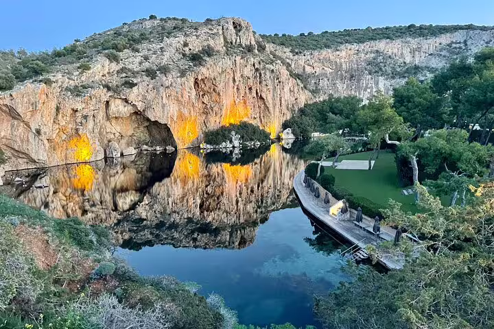 Lake Vouliagmeni cliffs and calm water on the Athens Riviera, scenic stop on a Cape Sounio private tour