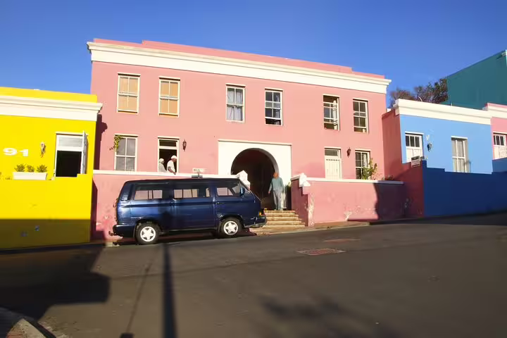 Colorful buildings in Cape Town's Bo-Kaap neighborhood, a vibrant stop on the Cape of Good Hope tour.
