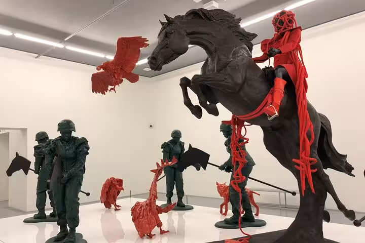 Explore contemporary art installations at a Cape Town gallery, part of a unique city tour with Table Mountain visit.