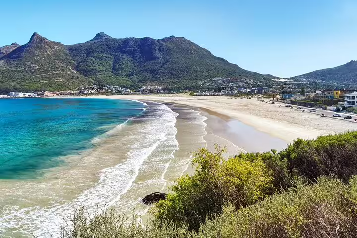 Scenic Cape Town coastal view of Muizenberg beach and mountains on a full-day Cape Peninsula sightseeing tour