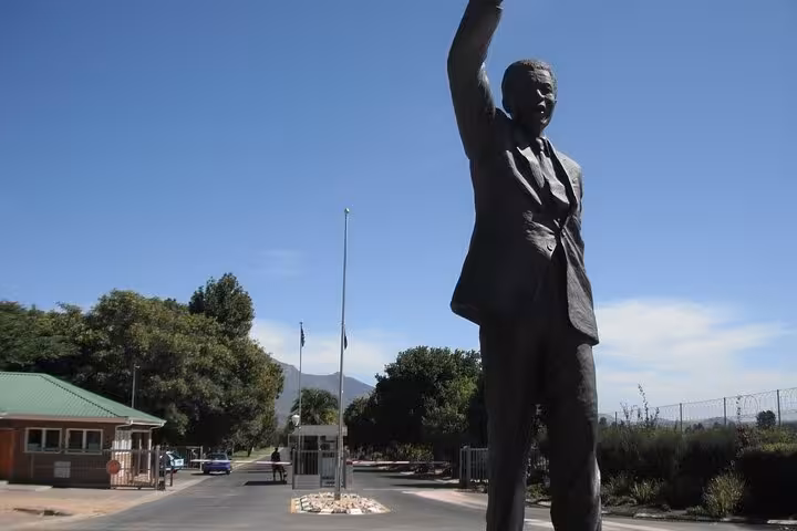 Iconic statue on a sunny day, part of the enriching cultural experiences on a Cape Town Winelands tour.