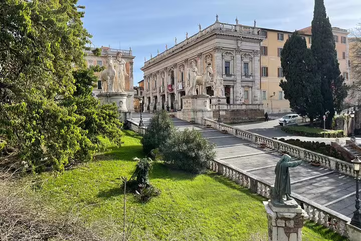 Capitoline Hill statues and Renaissance palaces bathed in sun on Rome Colosseum, Roman Forum and Palatine Hill walking tour