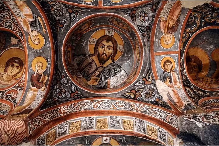 Frescoed ceiling inside Cappadocia cave church, a highlight on a private tour with lunch in Göreme