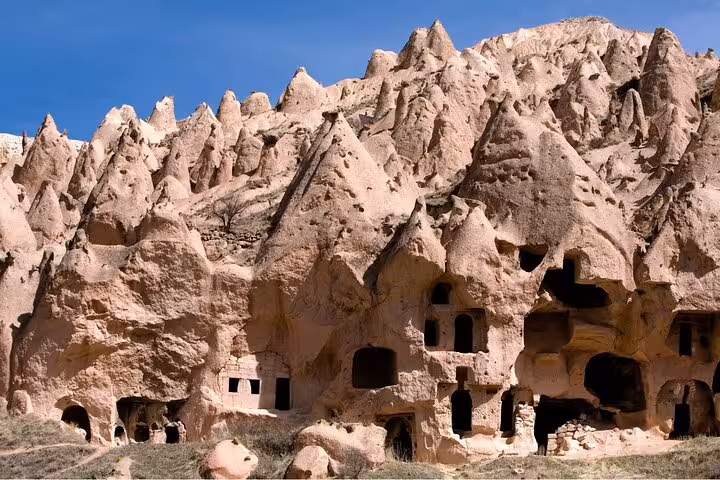Cappadocia cave dwellings and fairy chimney cliffs, highlights on daily tour from Istanbul hotels with flights