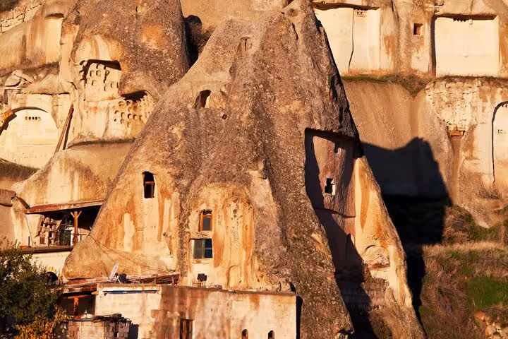 Close-up of Cappadocia cave houses carved in Göreme rock formations on a private all-inclusive 2-day tour