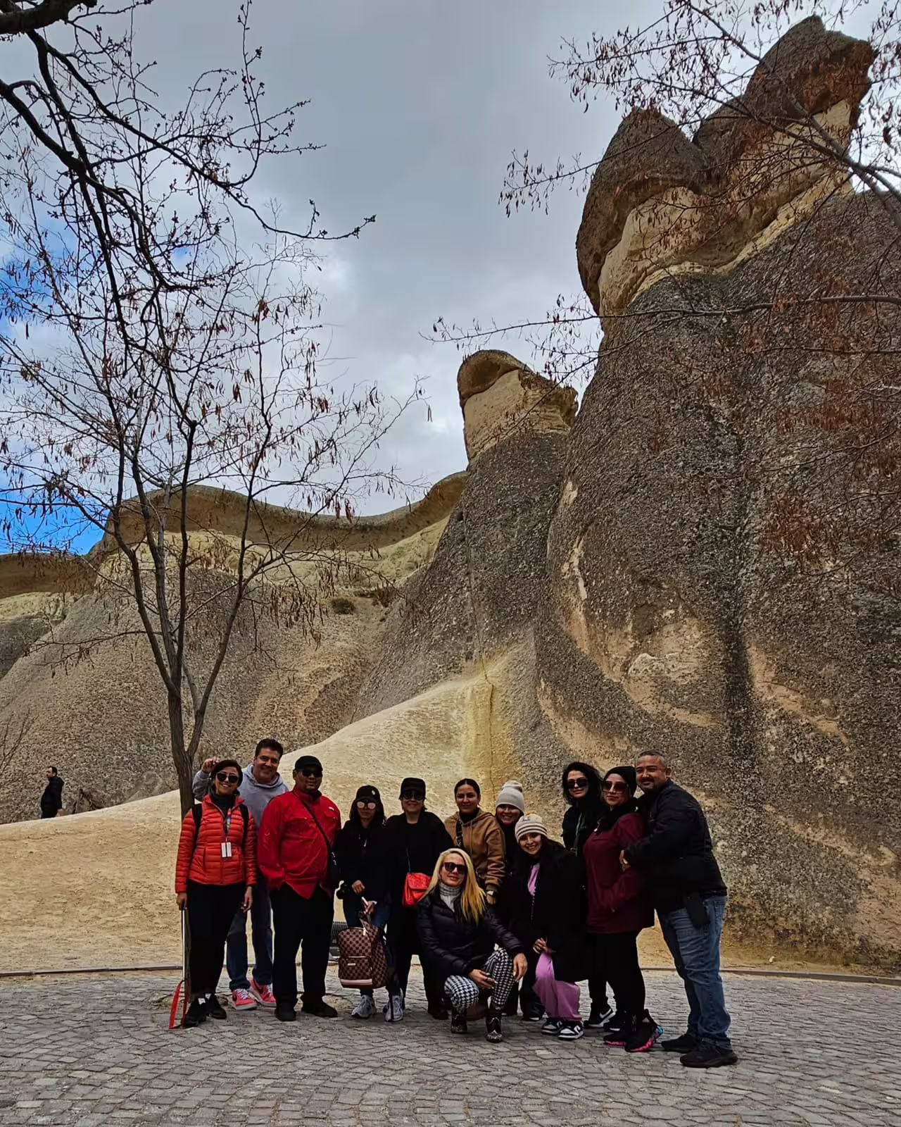 Group photo at Cappadocia fairy chimneys on Full Day Cappadocia from Istanbul by flight guided tour