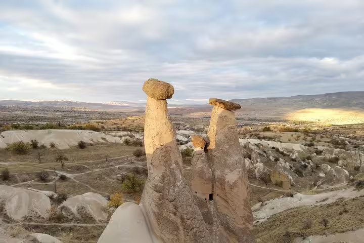 Cappadocia fairy chimney hoodoos at sunrise viewpoint, included in 3-day Istanbul to Cappadocia cave hotel trip