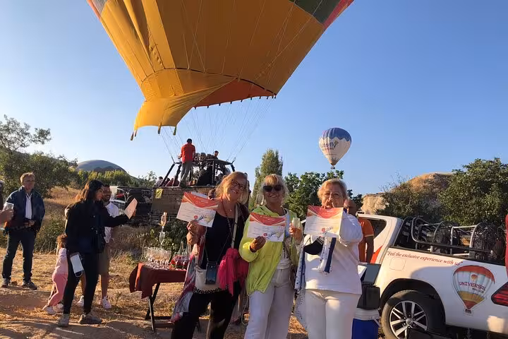 Cappadocia hot air balloon landing celebration with certificates, private tour with English guide and luxury vehicle