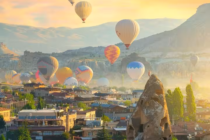 Sunrise hot air balloons over Göreme, Cappadocia, on a private guided 2-day all-inclusive tour option