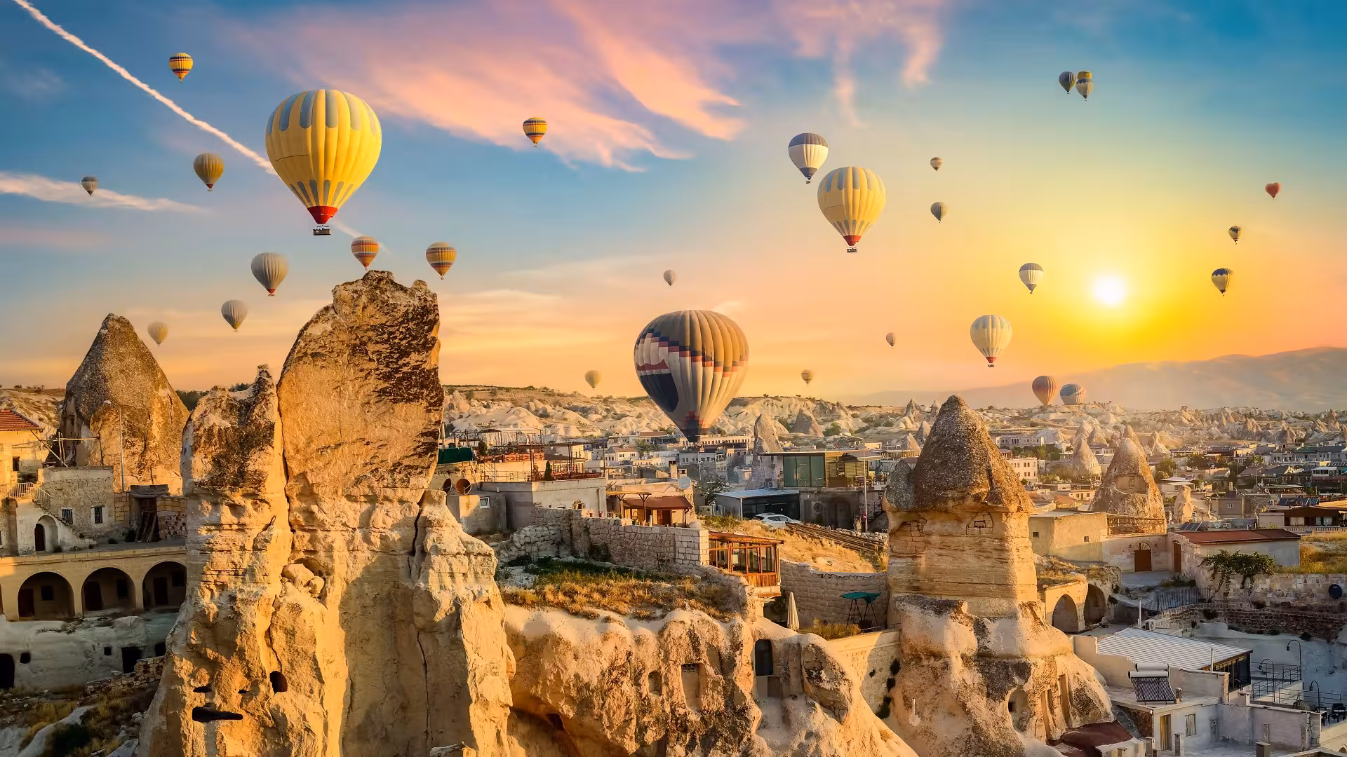 Cappadocia sunrise hot air balloons over Göreme fairy chimneys on 5-day Istanbul Cappadocia tour