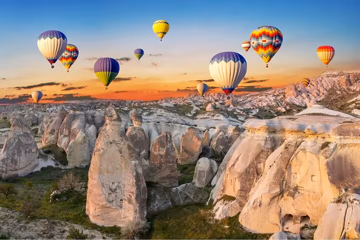 Cappadocia hot air balloons over fairy chimneys at sunrise, highlight of an 8 day Mediterranean tour