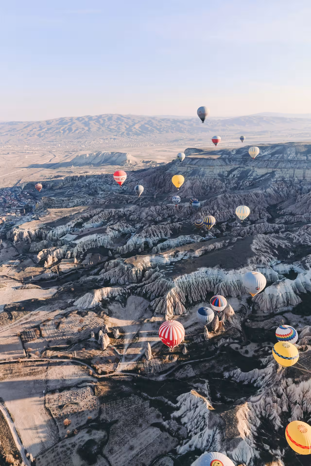 Cappadocia hot air balloons floating over fairy chimneys at sunrise on Timeless Turkey 8 days itinerary