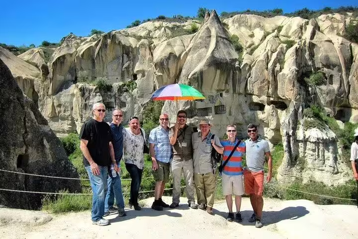 Travel group photo at Cappadocia valley viewpoint on 2 day 1 night Cappadocia tour from Istanbul