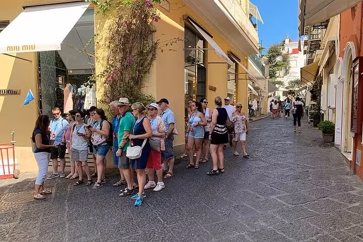 Tour group exploring charming streets in Anacapri on the Capri & Anacapri full-day hydrofoil tour from Amalfi.
