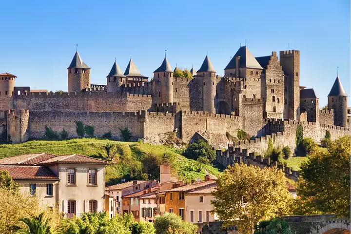 Panoramic view of Carcassonne medieval fortified city with towers and ramparts on a sunny day