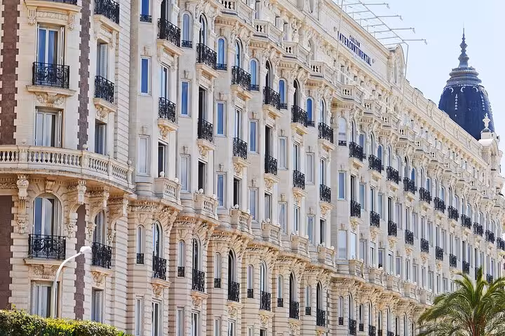 Carlton InterContinental Hotel facade with ornate ironwork balconies on the French Riviera in Cannes