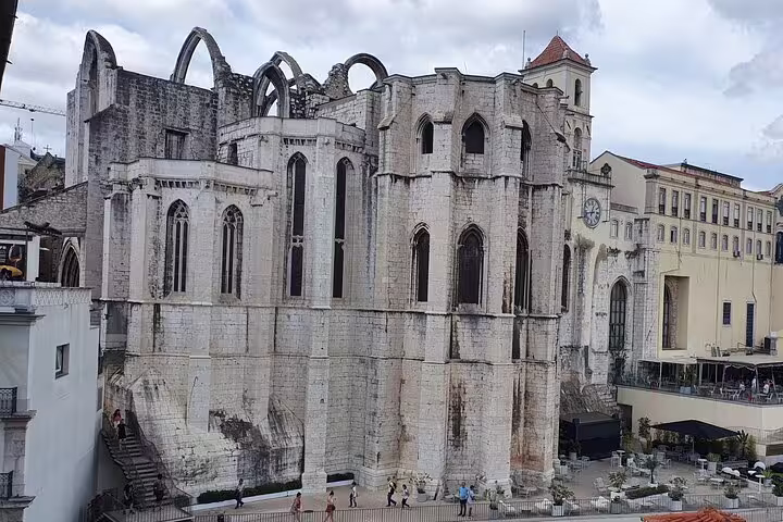Gothic ruins of Carmo Convent in Lisbon's Old Town, a highlight on the Lisboa Private Full-Day Tour exploring Belem and beyond.