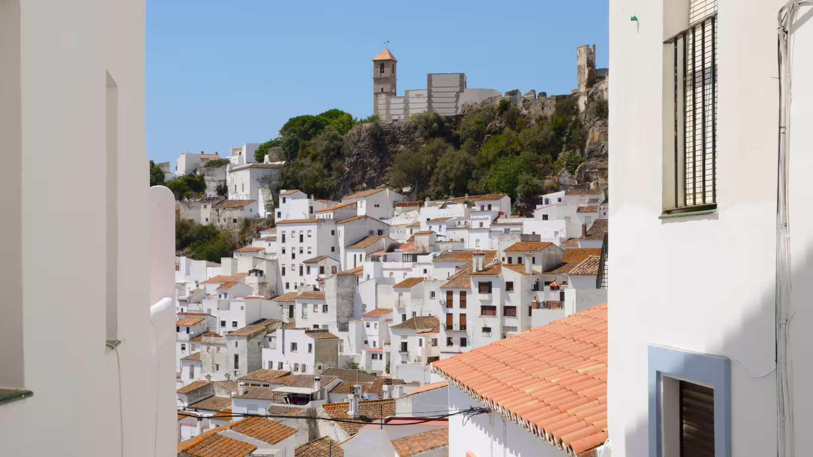 Whitewashed Casares village and hilltop castle view on a private tour from Costa del Sol, Andalusia