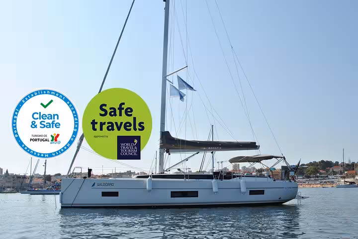 Modern sailboat in Cascais marina for a private 2-hour sailing cruise with drinks on the Atlantic coast