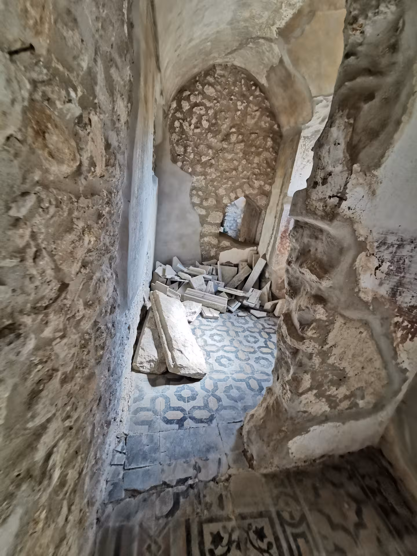 Explore ancient stone ruins with intricate mosaic floors on the Cassino Red Poppy walking tour in Italy.