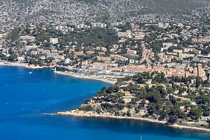 Aerial view of Cassis harbor and Mediterranean bay, scenic stop on fullday Aix-en-Provence, Cassis and Marseille