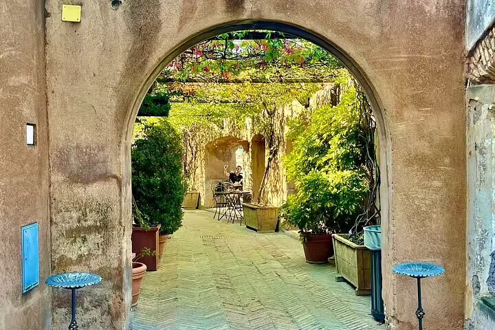 Peaceful vine-covered terrace and archway inside Castel Sant’Angelo, featured on St Peter’s Basilica combo tour