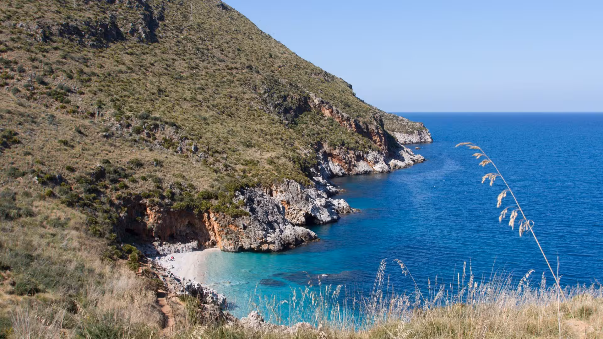 Scenic coastal view of Cornino's turquoise waters near Castellammare del Golfo, perfect for an ebike tour adventure.