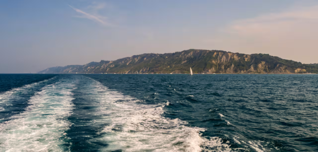 Boat wake on the Adriatic Sea during Cesenatico afternoon cruise along the Riviera Romagnola coastline
