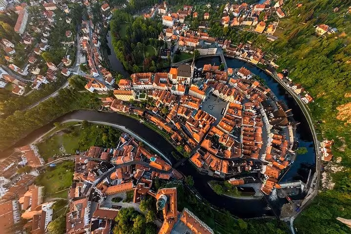 Aerial view of Cesky Krumlov river bend and historic center, highlight of private day tour from Salzburg