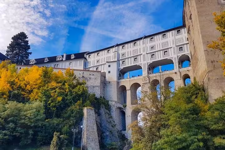 Český Krumlov Castle arches and courtyard, highlight stop on Vienna to Salzburg private transfer via Czechia