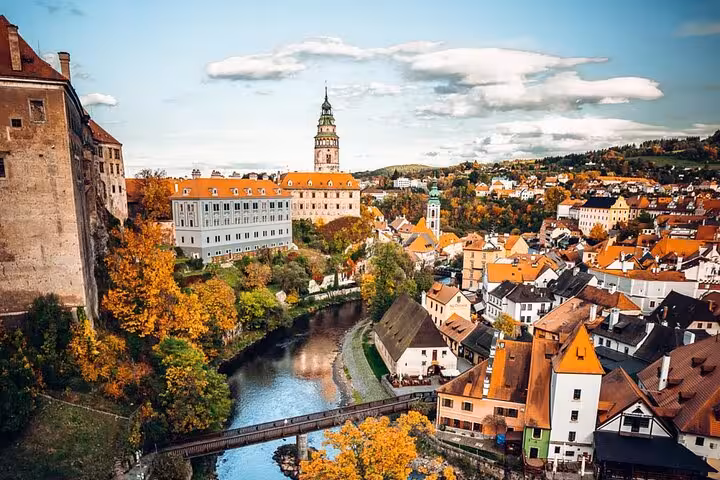 Panoramic Cesky Krumlov old town and castle on Vltava River, private day tour from Salzburg