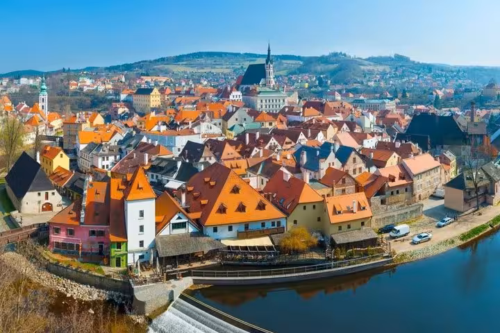 Cesky Krumlov old town rooftops and river view, scenic stop on Salzburg to Vienna private transfer tour