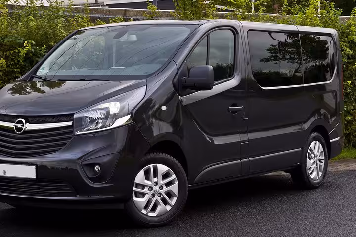 Modern black van for Chania Airport to Rethymno private taxi transfer in Crete, door-to-door ride