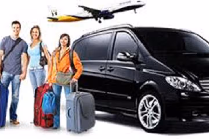 Travelers with luggage beside private van for Chania Airport to Rethymno transfer, Crete airport taxi