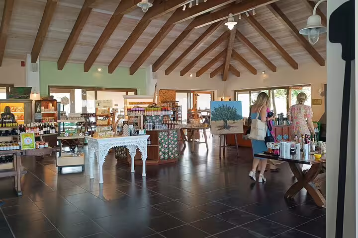 Interior of a charming shop at Chania Botanical Garden offering local products and souvenirs for tourists.