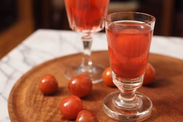 Refreshing cherry liqueur glasses on a Lisbon street food tour.