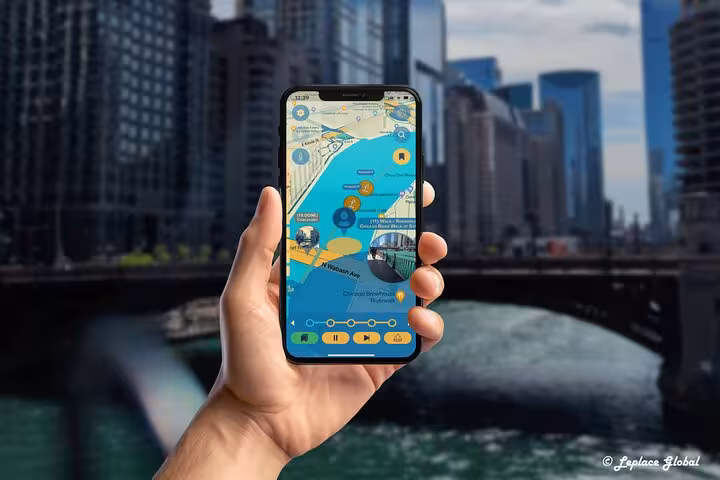Hand holding smartphone with Chicago River walking tour map app showing Michigan Avenue hidden gems landmarks