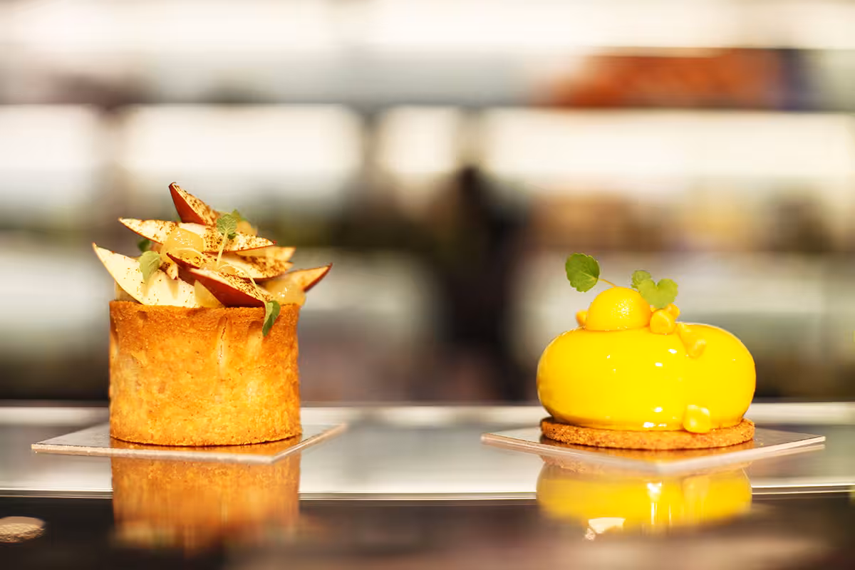 Indulge in exquisite pastries and macarons on the Saint-Germain walking tour, featuring unique French desserts.