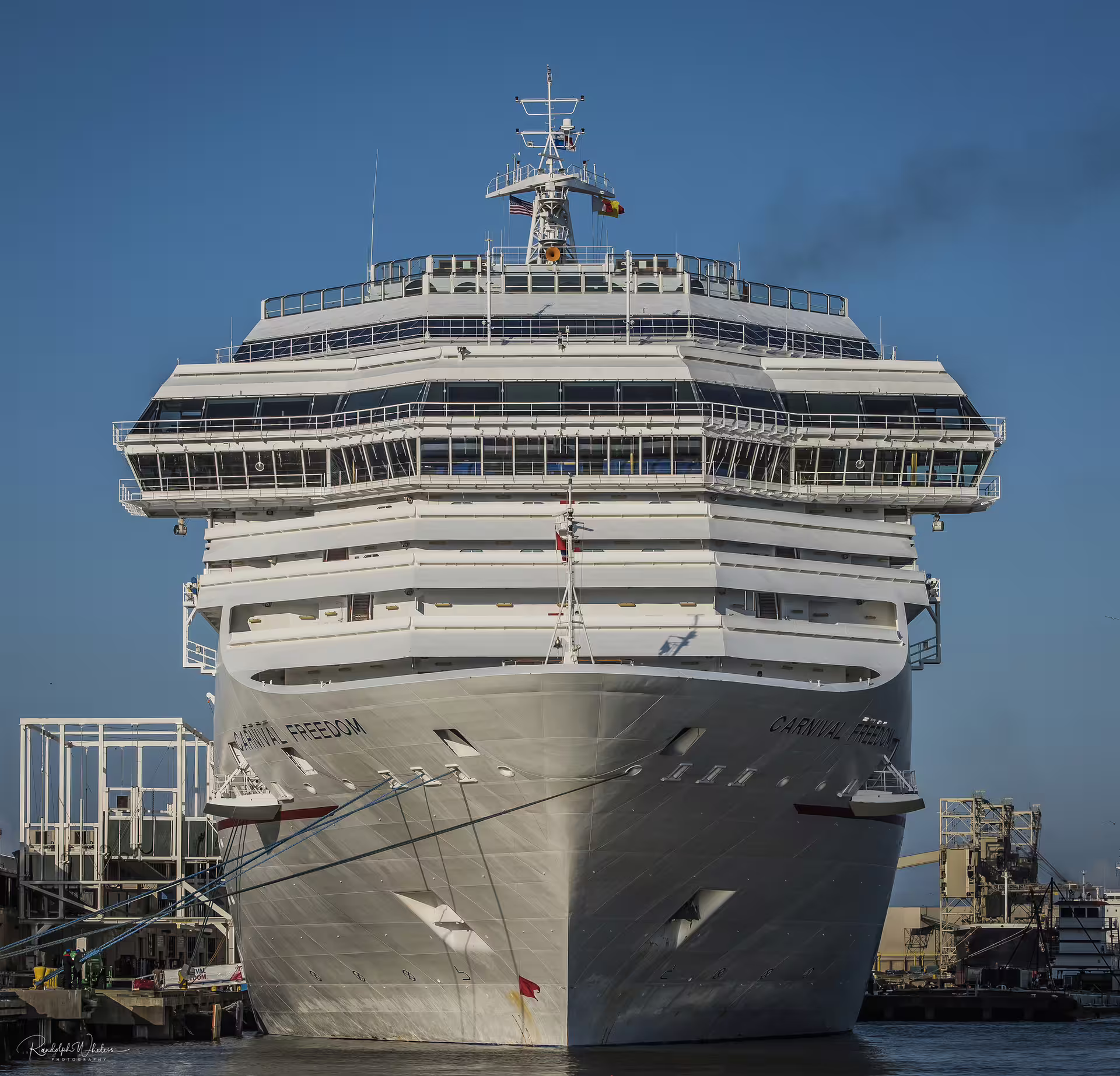Large white cruise ship docked at Civitavecchia Port, starting point for shared shuttle transfers to Rome Fiumicino Airport
