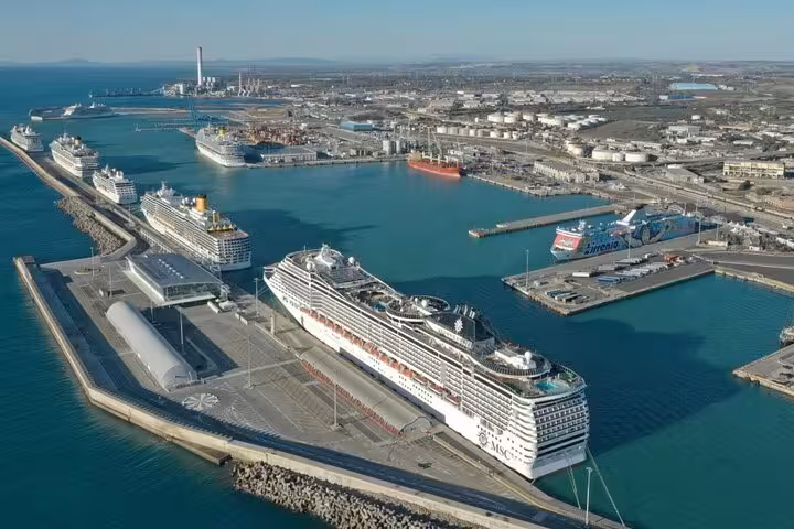Aerial view of Civitavecchia Port with cruise ships, ideal for seamless transfer to Rome.