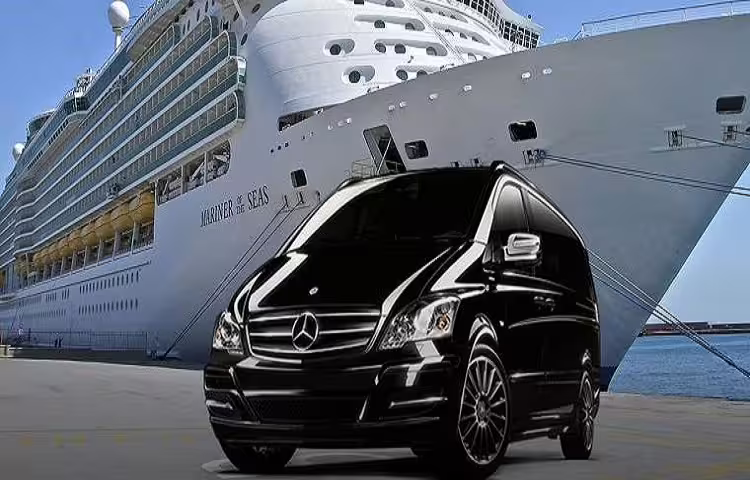Luxury Mercedes minivan awaiting passengers beside a cruise ship at Civitavecchia Port for private transfer to Rome hotel