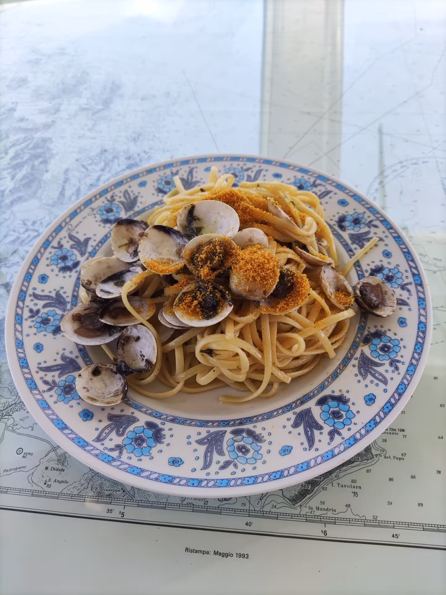 Indulge in clam spaghetti with bottarga on a La Maddalena Archipelago boat tour, offering a taste of Sardinian cuisine.