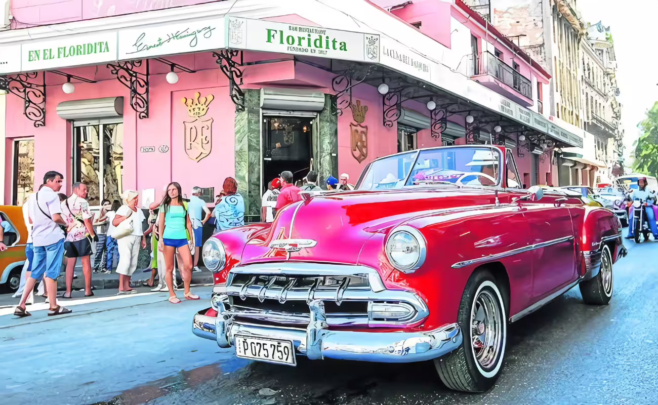Classic red convertible outside El Floridita in Old Havana on a 3-hour private guided city tour