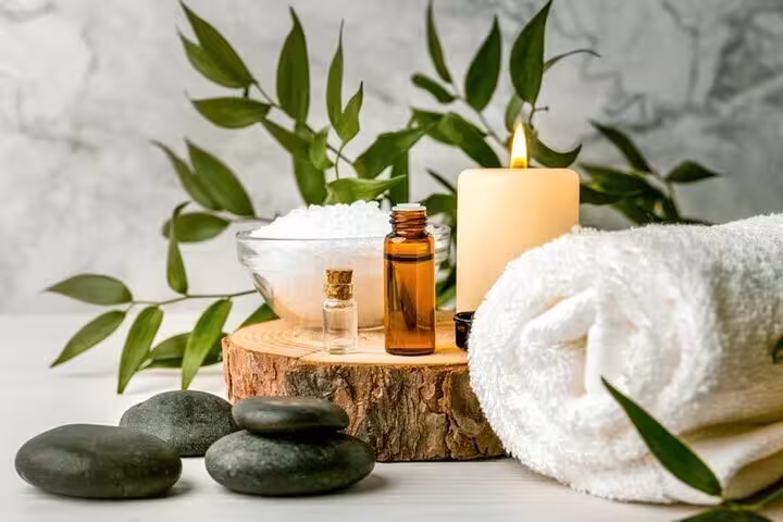 Aromatherapy oils, hot stones and towel setup at Hurghada Cleopatra Deluxe Spa with sauna and jacuzzi