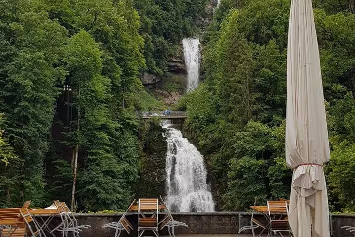 Breathtaking waterfall surrounded by lush greenery, a highlight of the CLOY Crash Landing on You private tour.