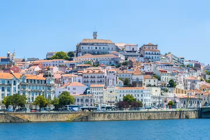 Coimbra riverside skyline with University hilltop, scenic viewpoint on Coimbra Nazare and Obidos day trip