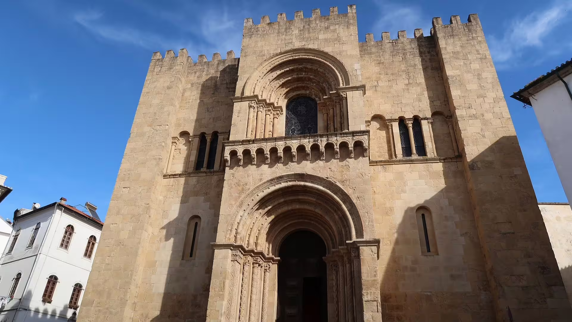 Discover the stunning Romanesque facade of Coimbra's Old Cathedral on this exclusive tour.