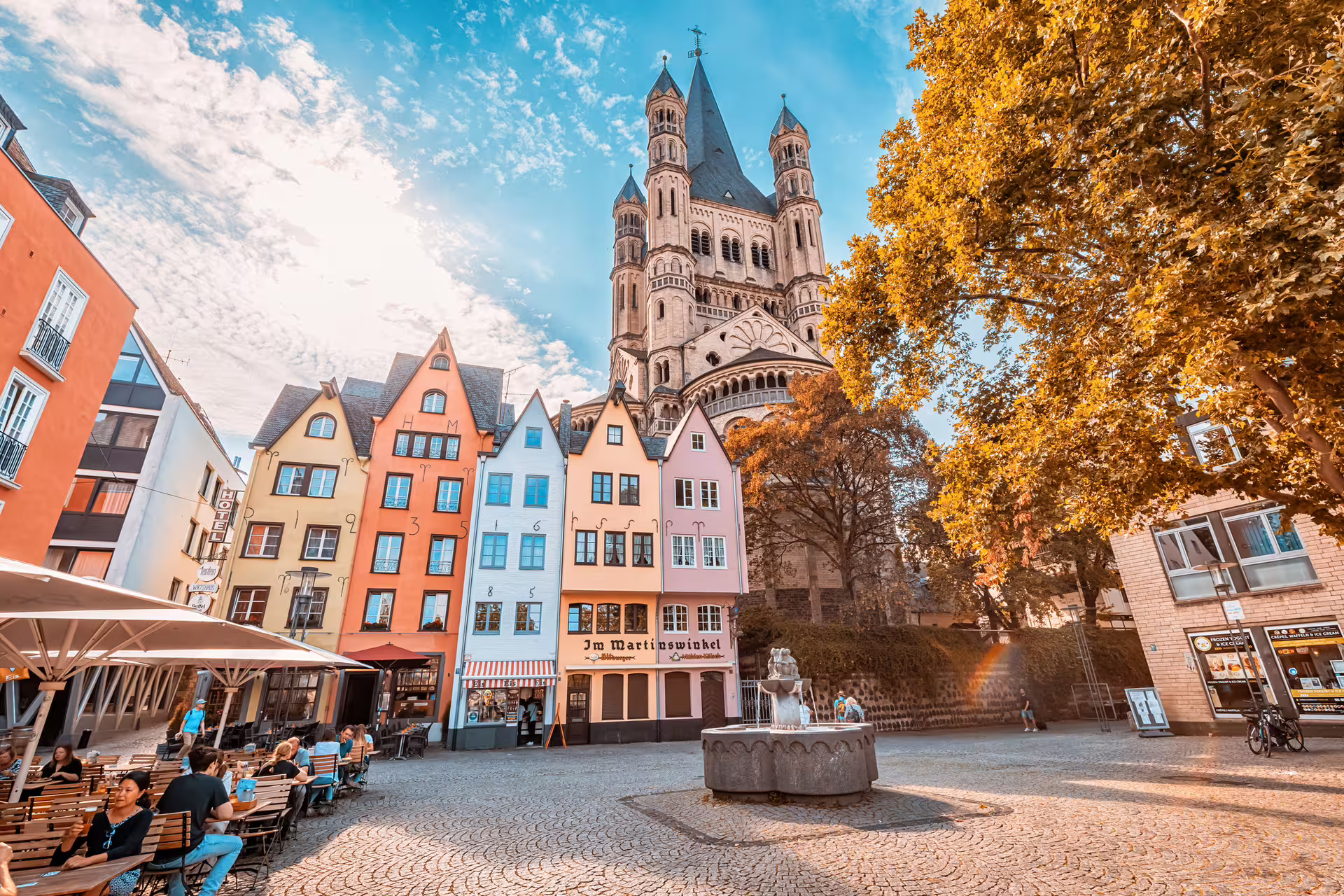 Martinswinkel square with Great St Martin church, perfect stop on Cologne 1-day walking tour audioguide