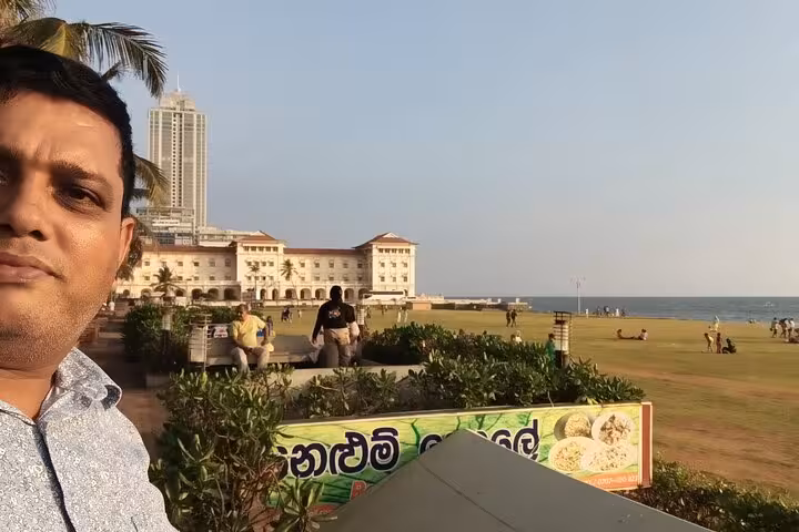 Galle Face Green seafront and skyline selfie stop on a Colombo City Tuk Tuk tour in Sri Lanka