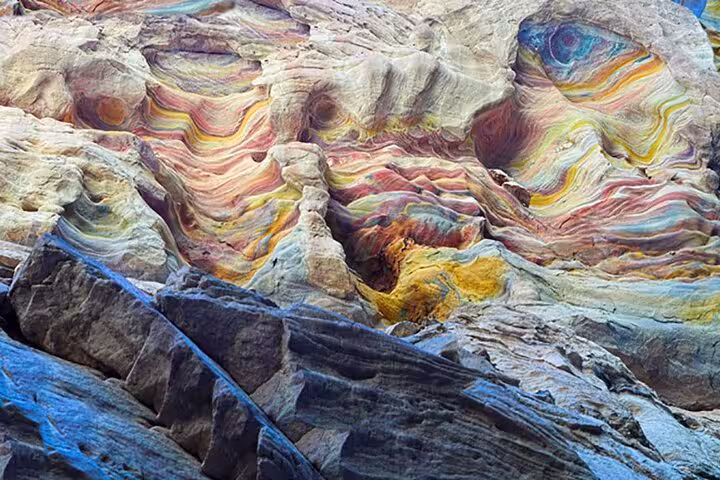 Vivid layered rock formations in the Colored Canyon on Sharm El-Sheikh jeep tour to Dahab and Blue Hole